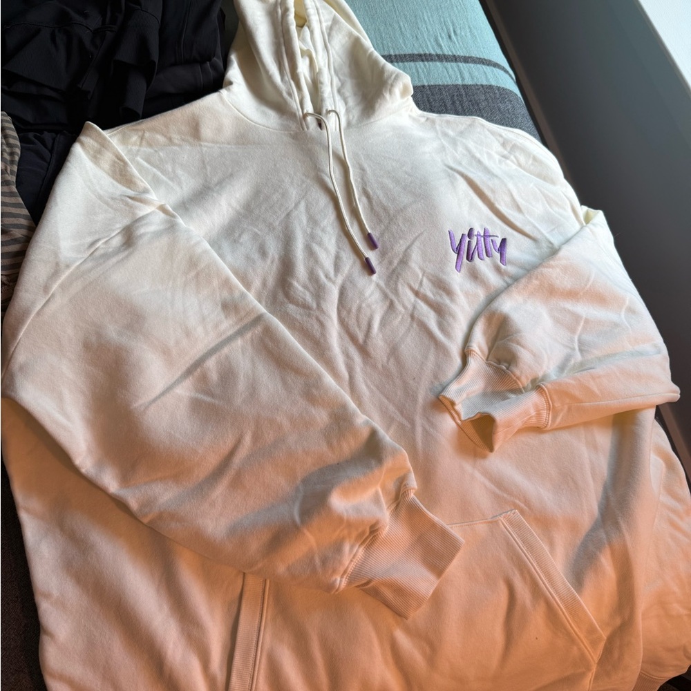 YITTY Cream Apparel with Purple Tag